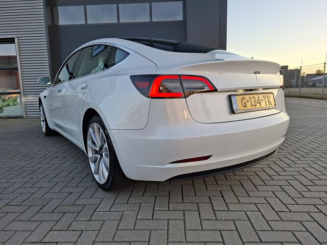 Tesla Model 3 Standard RWD Plus 60 kWh ?SOH 86.9% Full Self Driving 3 ?Autopilot ?Panoramadak ?Vol Leder ?360º Camera ?Stoelverwarming ?Trekhaak ?Origineel NL