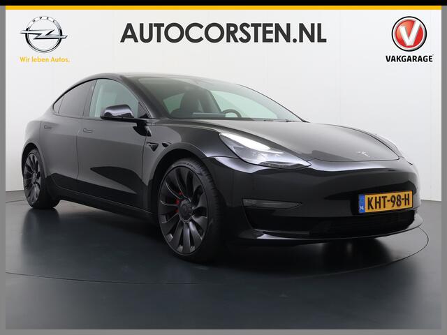 Tesla Model 3 Performance AWD 513PK Facelift Warmtepomp Lmv 20" Panoramadak Adap.Cruise Elek.Verwarmde Stoelen+Memory Inductieladen Navi Camera's Ecc Leder SOH 85.6% Led Pdc Privacy Glas Elek.Achterklep Keyless 4WD Fabrieksgarantie op Accu en Motor tot 18-02-2029/192.0