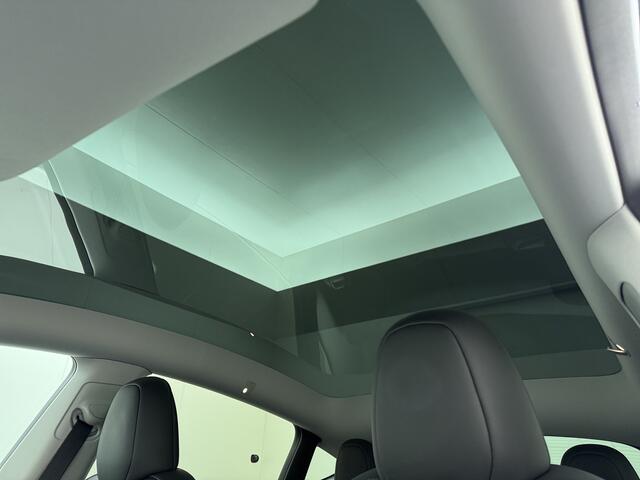 Tesla Model Y LFP-Accu SOH 97% Leder Lmv 20" Warmtepomp Camera's Panormadak Adap.Cruise Navi RWD Ecc Autopilot Stoel+Stuur+Achterbank Verwarming Elek.Achterklep Dodehoek detector Draadloze telefoonlader Origineel Nederlandse Auto