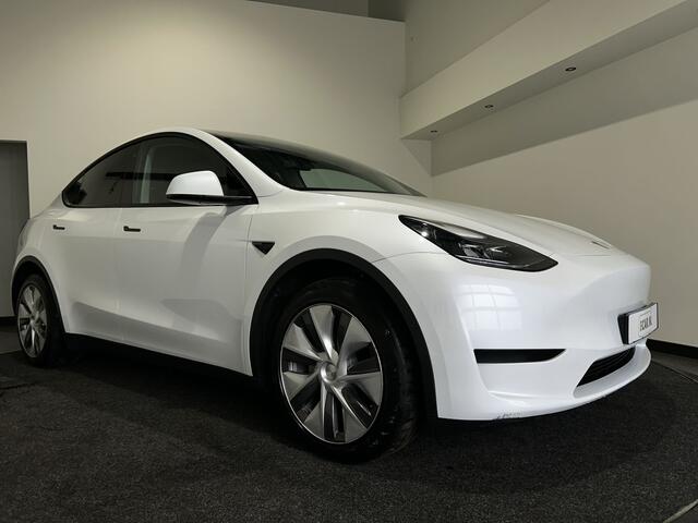 Tesla Model Y RWD 58 kWh | Leder Interieur | Houten afwerking | Verwarmde stoelen en stuur | Soh (batterijcheck) Waarde 95,1 %