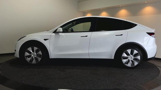 Tesla Model Y RWD 58 kWh | Leder Interieur | Houten afwerking | Verwarmde stoelen en stuur | Soh (batterijcheck) Waarde 95,1 %