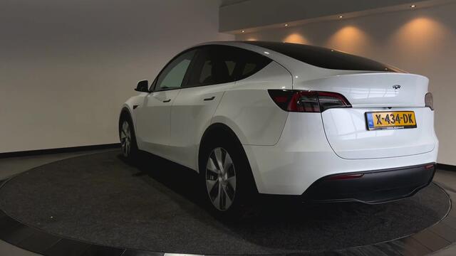 Tesla Model Y RWD 58 kWh | Leder Interieur | Houten afwerking | Verwarmde stoelen en stuur | Soh (batterijcheck) Waarde 95,1 %