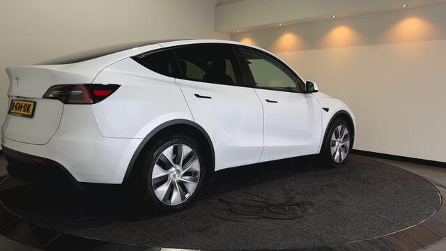 Tesla Model Y RWD 58 kWh | Leder Interieur | Houten afwerking | Verwarmde stoelen en stuur | Soh (batterijcheck) Waarde 95,1 %