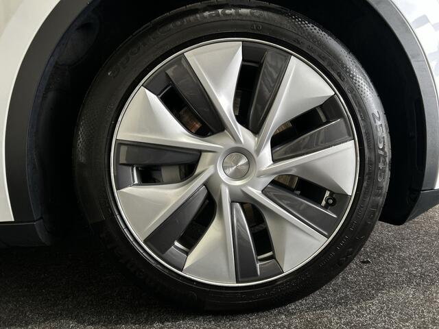 Tesla Model Y RWD 58 kWh | Leder Interieur | Houten afwerking | Verwarmde stoelen en stuur | Soh (batterijcheck) Waarde 95,1 %