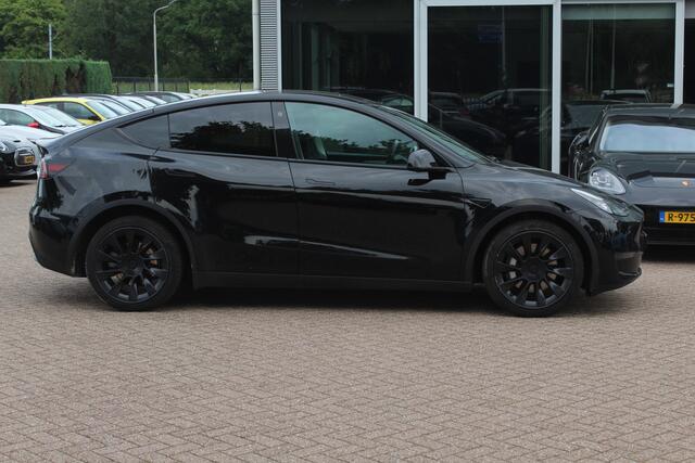 Tesla Model Y Long Range AWD 75 kWh / Autopilot / Panoramadak / Camera / 20'' / Keyless / Leder / Dodehoek / Navigatie / Stoelverwarming