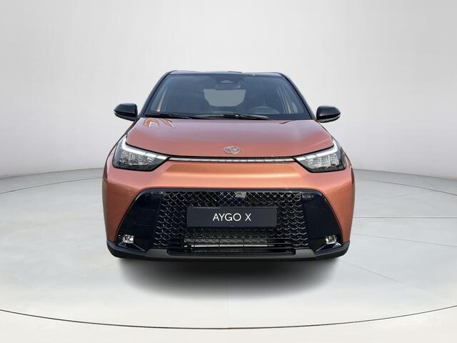 Toyota AYGO X Hybrid 115 pulse | Cinnamon met zwart dak | Nieuw uit voorraad leverbaar |
