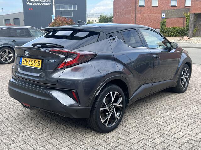 Toyota C-HR 1.8 Hybrid Style Navigatie Camera Leer Two Tone Keyless 18 Inch Velgen ACC Dab Extra Getint Glas NL Auto