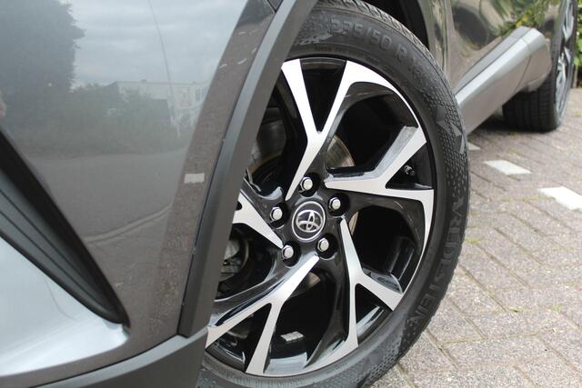 Toyota C-HR 1.8 Hybrid Dynamic | Rijklaar | Trekhaak | Keyless | Stoelverw. | Camera | Navi | All-season | Dealer onderhouden