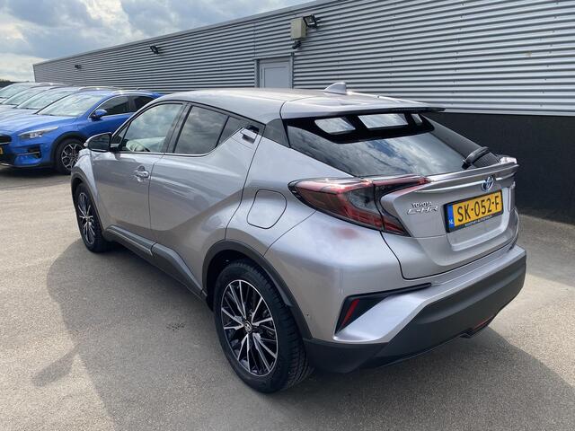 Toyota C-HR 1.8 Hybrid Executive Nieuw geleverd en dealeronderhouden, 1e eign. Stoel- & Stuurwielverwarming, achteruitrij camera, adaptieve cruise control, dodehoek detectie, keyless, Navigatie