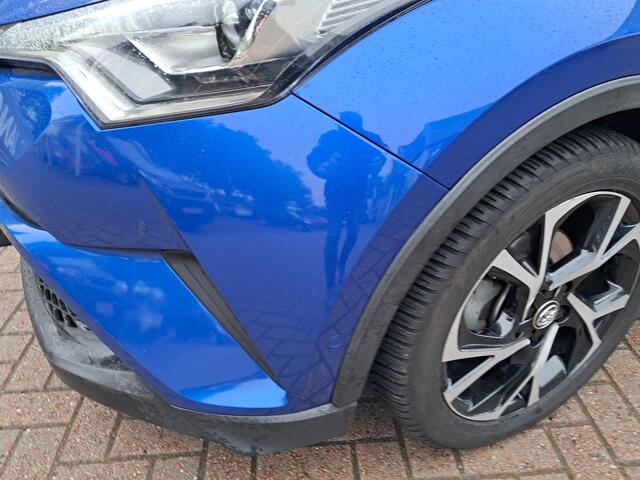 Toyota C-HR 1.8 Hybrid Bi-Tone | Clima | Cruise | Vol leder | Navigatie | LM Velgen | Keyless | Camera | RIJKLAARPRIJS INCL 12 MAANDEN GARANTIE EN BEURT