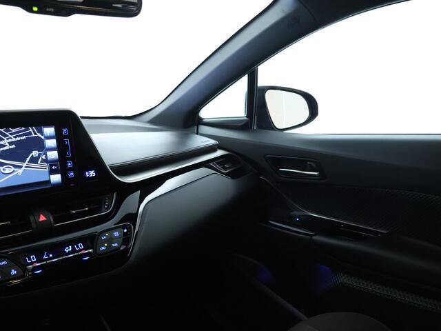 Toyota C-HR 1.8 Hybrid Style Limited | Adaptieve cruise control | Navigatie | Dodehoek waarschuwing | Bi-Tone | Stoelverwarming |