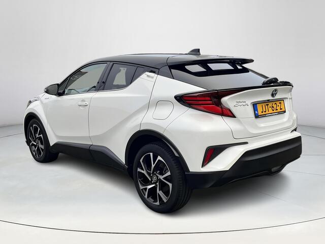 Toyota C-HR 1.8 Hybrid Bi-Tone | Carplay | Dode hoek waarschuwing | Stoelverwarming | Keyless entry |