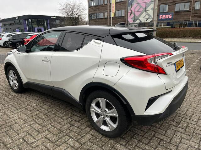 Toyota C-HR 1.8 Hybrid Bi-Tone | Stoelverwarming | Camera | Navi | Zomer & Winter Set | Dealer Onderhouden |
