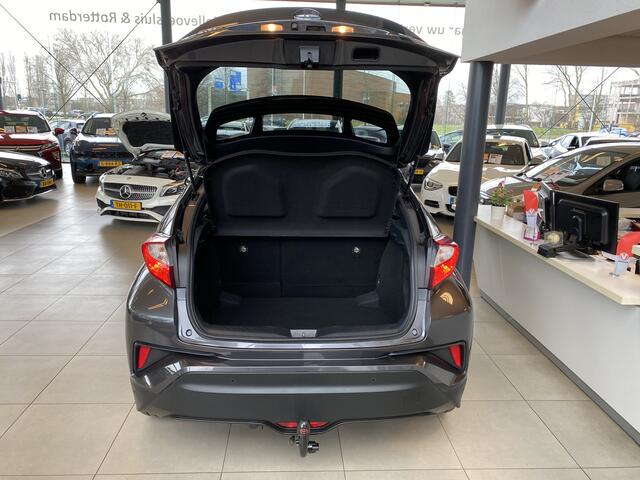 Toyota C-HR 1.8 Hybrid Bi-Tone,Automaat,Navigatie,Achteruitrijcamera,Climate&Cruisecontrol Adaptief,Trekhaak,Spraakbediening,Keyless,Stoelverwarming,V&A Sensoren,DAB,Dealer Onderhouden,18 Inch Lmv