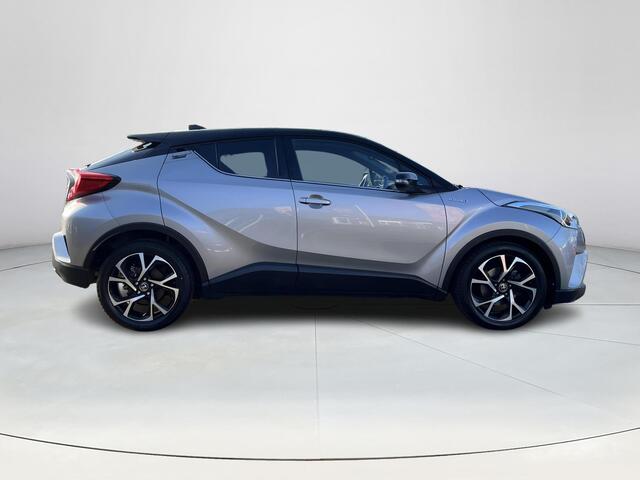 Toyota C-HR 1.8 Hybrid Bi-Tone | 1e eigenaar | Dealeronderhouden | Navigatie | 18 inch LM-velgen |