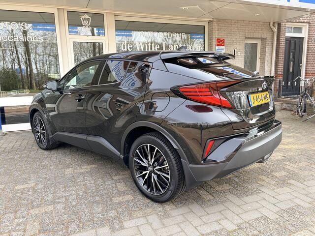 Toyota C-HR 1.8 Hybrid Executive 23.000 K.M. Verw.+in hoogte verst.b. stoelen/Leder stuur+bekl.//Navi Full M./Achteruitrij cam./Park.sens. v+a/Keyless entry+start/Dodehoek detect./Adapt. kopl.+cruisecontr./Audio instal. Premium/18 Inch
