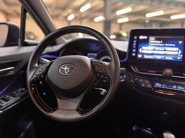Toyota C-HR 1.8 Hybrid Automaat Bi-Tone Navi Camera lederen Bekleding Stoelverwarming Adap Cruise NL-Auto