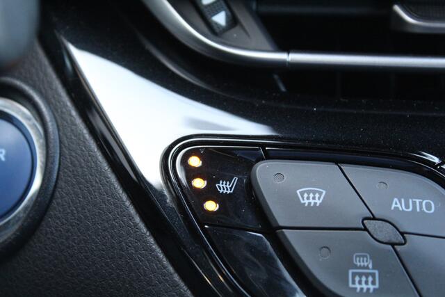 Toyota C-HR 1.8 Hybrid Bi-Tone | Rijklaar | Stoel-/stuurverw. | Blind Spot | Trekhaak | PDC | Camera | All-season | Adap.cruise