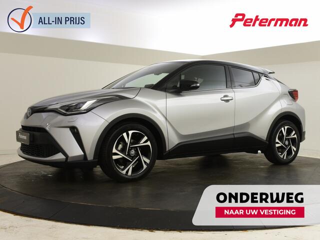 Toyota C-HR 1.8 Hybrid Bi Tone | lage km-stand | PDC | Navigatie | BLIS |