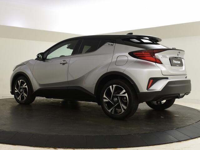 Toyota C-HR 1.8 Hybrid Bi Tone | lage km-stand | PDC | Navigatie | BLIS |