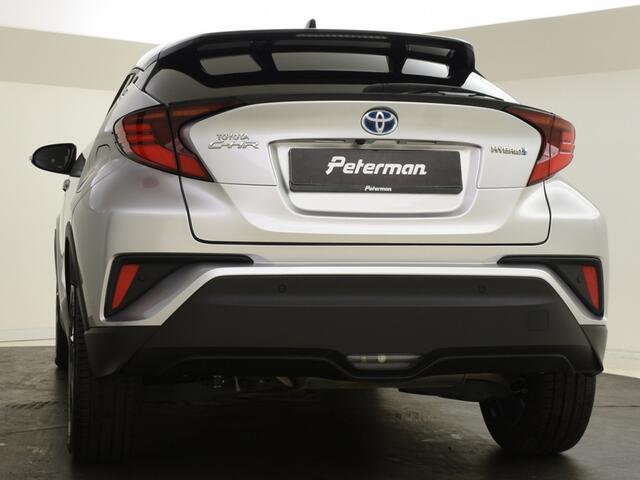 Toyota C-HR 1.8 Hybrid Bi Tone | lage km-stand | PDC | Navigatie | BLIS |