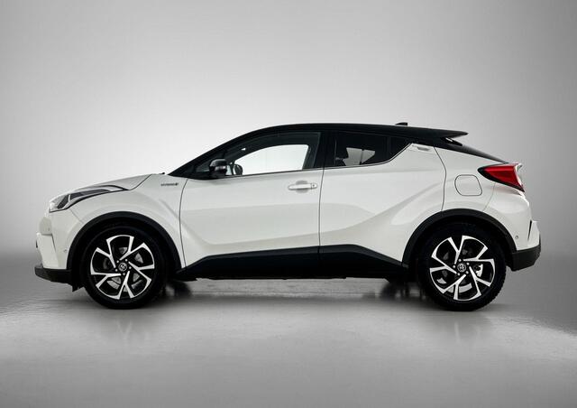 Toyota C-HR 1.8 Hybrid Bi-Tone Plus | Airco | Achteruitrijcamera | All Seasonbanden | Blind Spot Warning | Cruise Control Adaptief | Dealeronderhouden | Keyless | Park Assist | Parkeersensoren Voor en Achter | Stoel- en Stuurverwarming | Trekhaak |