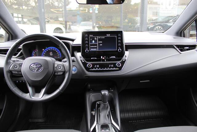 Toyota COROLLA Touring Sports 1.8 Hybrid Dynamic Plus | Rijklaar | HUD | Elek klep | Stoel/stuur-verwarming | Clima | Apple/Android