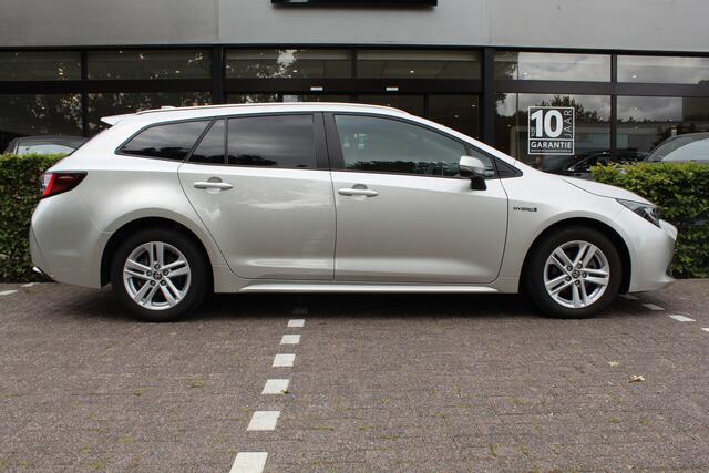 Toyota COROLLA Touring Sports 1.8 Hybrid Dynamic Plus | Rijklaar | HUD | Elek klep | Stoel/stuur-verwarming | Clima | Apple/Android