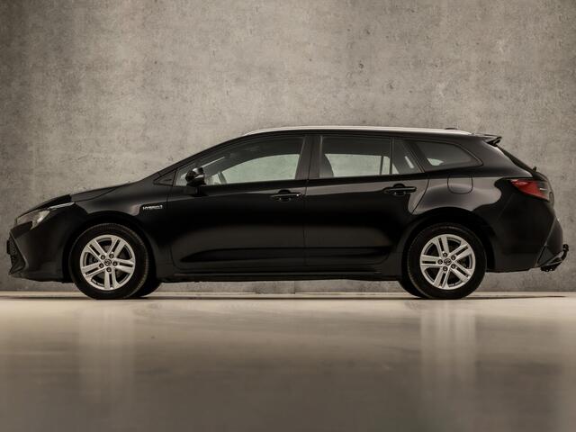 Toyota COROLLA Touring Sports 1.8 Hybrid Sport Automaat (APPLE CARPLAY, NAVIGATIE, ADAPTIVE CRUISE, KEYLESS, SPORTSTOELEN, CAMERA, TREKHAAK, ZWART HEMEL, NIEUWSTAAT)
