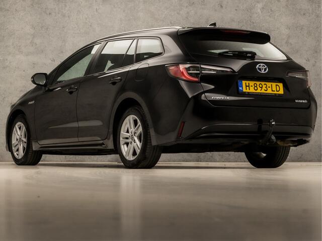 Toyota COROLLA Touring Sports 1.8 Hybrid Sport Automaat (APPLE CARPLAY, NAVIGATIE, ADAPTIVE CRUISE, KEYLESS, SPORTSTOELEN, CAMERA, TREKHAAK, ZWART HEMEL, NIEUWSTAAT)