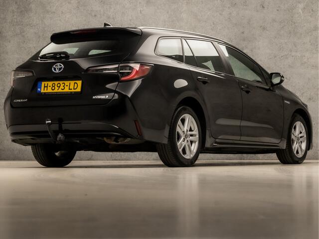 Toyota COROLLA Touring Sports 1.8 Hybrid Sport Automaat (APPLE CARPLAY, NAVIGATIE, ADAPTIVE CRUISE, KEYLESS, SPORTSTOELEN, CAMERA, TREKHAAK, ZWART HEMEL, NIEUWSTAAT)