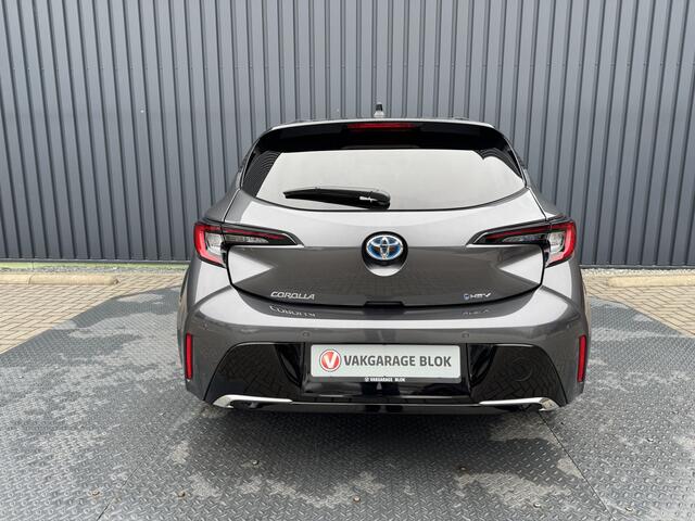 Toyota COROLLA Hybrid 140 Executive / Bi tone | Schuif-/kantel dak | JBL | Head-up | 18 inch | Rijklaar!!!