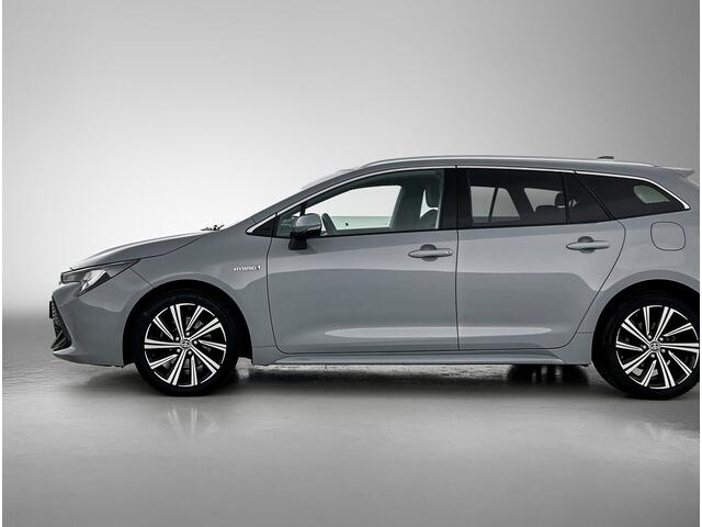 Toyota COROLLA Touring Sports 2.0 Hybrid Business Plus | 1e Eigenaar | BTW'er | Trekhaak | Hulpveren |