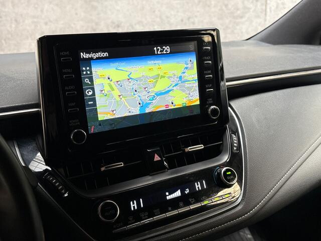 Toyota COROLLA 1.8 Hybrid Sport Automaat (NAVIGATIE, LEDER, VIRTUAL COCKPIT, CAMERA, SPORTSTOELEN, GETINT GLAS, ADAPTIVE CRUISE, NIEUWE APK, NIEUWSTAAT)