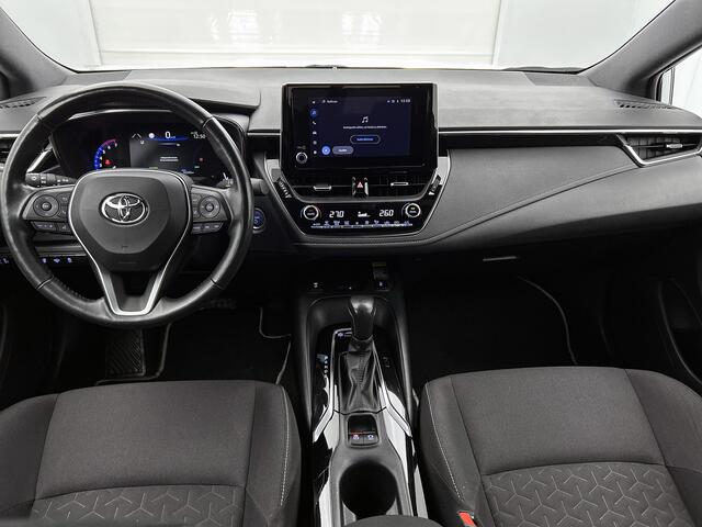 Toyota COROLLA 1.8 Hybrid Dynamic ACC | PDC v+a | Stoel en stuurverwarming | Aut. inparkeren | QI | Camera |