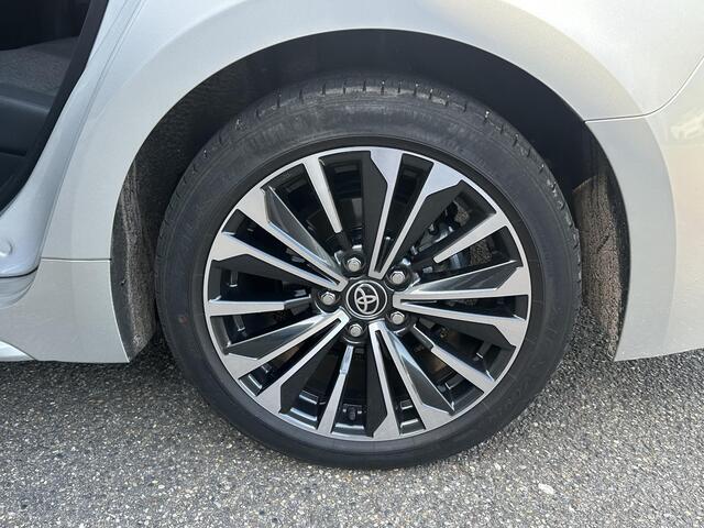 Toyota COROLLA Touring Sports Hybrid 140 Business Plus VAN ¤29.900 VOOR ¤27.877 | UW WK-VOORDEEL ¤2.023| TOYOTA GARANTIE T/M 2034| AFNEEMBARE TREKHAAK| CAMERA| STOEL + STUURVERWARMING| VOORRUITVERWARMING|