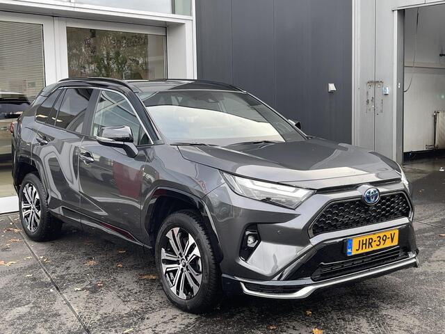 Toyota RAV4 2.5 Plug-in Hybrid AWD Bi-Tone Plus Schuif-/kanteldak | Lederen bekleding | JBL Premium geluid | Dodehoekdetectie