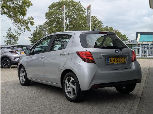 Toyota YARIS 1.5 Hybrid Trend Bi-Tone Limited | Camera | Climate control | Elek. ramen | Navi | 15" Lichtmetaal | PDC A