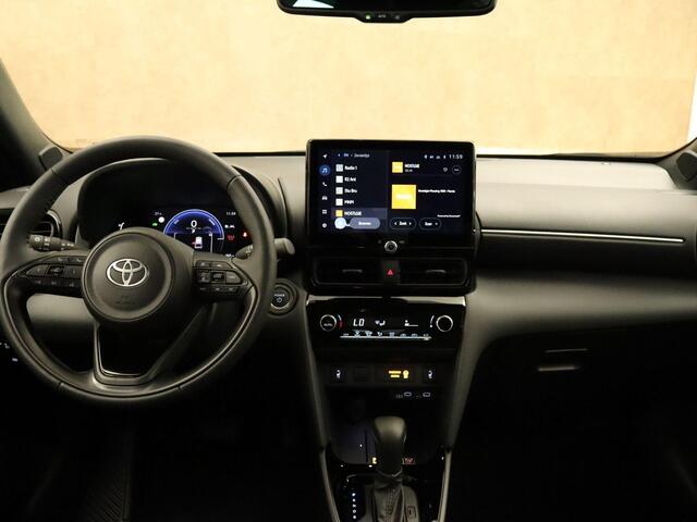 Toyota YARIS Cross 1.5 Hybrid 115 First Edition - DIRECT UIT VOORRAAD LEVERBAAR - ADAPTIEVE CRUISE CONTROL - STOELVERWARMING - APPLE CARPLAY/ANDROID AUTO - EXTRA GETINT GLAS - CLIMATE CONTROL - KEYLESS START/ENTRY - NAVIGATIE FULL MAP - LICHTMETALEN VELGEN 17 INCH