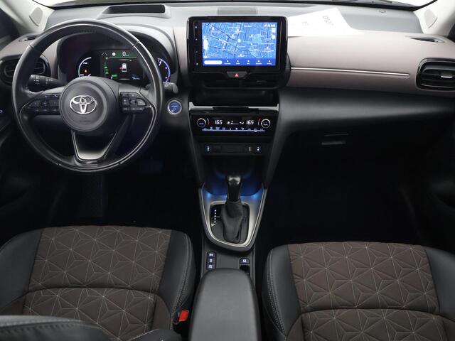 Toyota YARIS Cross 1.5 HYBRIDE EXECUTIVE BI-TONE GARANTIE TOT 9-2032 .Dodehoek detectie . JBL Audio . Stoel verwarming .