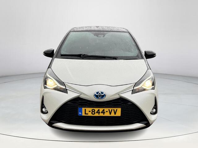 Toyota YARIS 1.5 Hybrid Bi-Tone | Parkeercamera | Stoelverwarming | Donker glas | Cruise control |