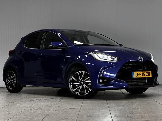 Toyota YARIS 1.5 Hybrid Dynamic/ Dealer Onderhouden!/ Trekhaak!/ Automaat/ LED Koplampen/ Apple+Android/ DAB+/ 16''LMV/ Grootlichtass./ Camera/ Clima/ Navi/ Cruise/ Bluetooth/ Multi.LEDER.Stuur/ Elek.Pakket/ Isofix/ Getint G