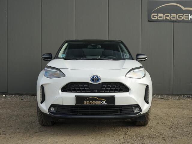 Toyota YARIS Cross 1,5-l-VVT-iE Elegant AWD-i Dealer onderh. / 1ste eigenaar / AWD / 17'' LM velgen / Carplay / Two-Tone / Half leder / Stoelverw. / Stuur verw. / Adap. Cruise