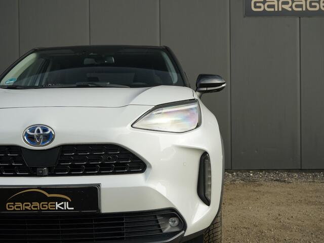 Toyota YARIS Cross 1,5-l-VVT-iE Elegant AWD-i Dealer onderh. / 1ste eigenaar / AWD / 17'' LM velgen / Carplay / Two-Tone / Half leder / Stoelverw. / Stuur verw. / Adap. Cruise