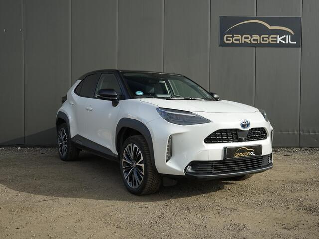 Toyota YARIS Cross 1,5-l-VVT-iE Elegant AWD-i Dealer onderh. / 1ste eigenaar / AWD / 17'' LM velgen / Carplay / Two-Tone / Half leder / Stoelverw. / Stuur verw. / Adap. Cruise