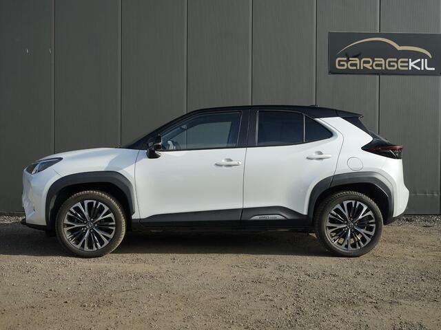 Toyota YARIS Cross 1,5-l-VVT-iE Elegant AWD-i Dealer onderh. / 1ste eigenaar / AWD / 17'' LM velgen / Carplay / Two-Tone / Half leder / Stoelverw. / Stuur verw. / Adap. Cruise