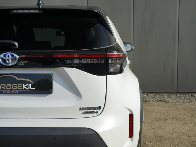 Toyota YARIS Cross 1,5-l-VVT-iE Elegant AWD-i Dealer onderh. / 1ste eigenaar / AWD / 17'' LM velgen / Carplay / Two-Tone / Half leder / Stoelverw. / Stuur verw. / Adap. Cruise