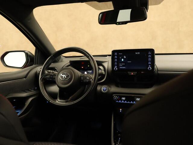 Toyota YARIS 1.5 Hybrid Launch Edition - HEAD-UP DISPLAY - APPLE CARPLAY/ANDROID AUTO - DODEHOEKDETECTIE - CRUISE CONTROL ADAPTIEF - CLIMATE CONTROL - KEYLESS ENTRY/START - VOORSTOELEN VERWARMD - EXTRA GETINT GLAS - LEDEREN BEKLEDING - BI-TONE