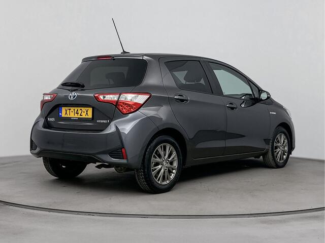 Toyota YARIS 1.5 Hybrid Dynamic | LM velgen | navigatie | getinten achter ramen |