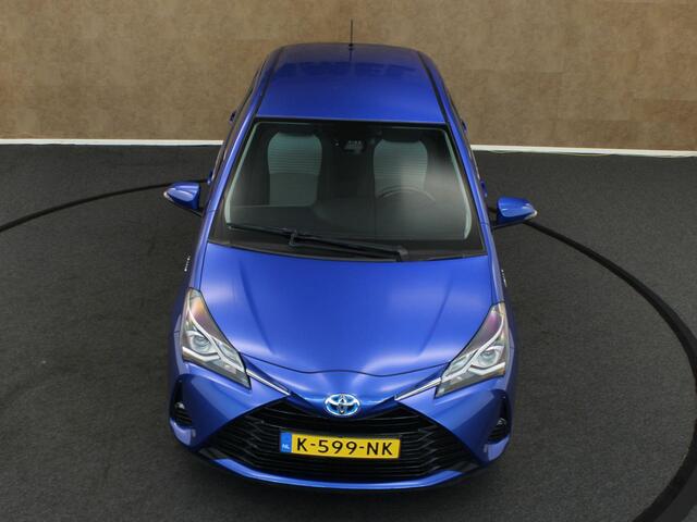 Toyota YARIS 1.5 Hybrid Dynamic - AIRCO AUTOMATISCH - ACHTERUITRIJCAMERA - CRUISE CONTROL - BLUETOOTH TELEFOONVOORBEREIDING - KEYLESS START - LEDEREN STUURWIEL